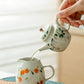 Plant ash + hand + powder falling flower ceramic small tea + tea making and tea drinking household + tea making utensil Kung Fu tea set