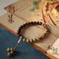 [Enter] A pair of beads, a string of beads, the original small red sandalwood classical Buddha bead bracelet.