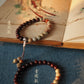 [Enter] A pair of beads, a string of beads, the original small red sandalwood classical Buddha bead bracelet.