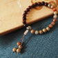 [Enter] A pair of beads, a string of beads, the original small red sandalwood classical Buddha bead bracelet.