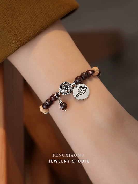 Small red sandalwood flower beaded hand female luxury small high-quality natural stone pull-out bracelet