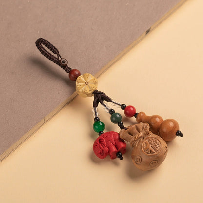 Mahogany gourd key buckle, steam piece cinnabar elephant Bodhi blessing bag key buckle can be used for fine packaging.