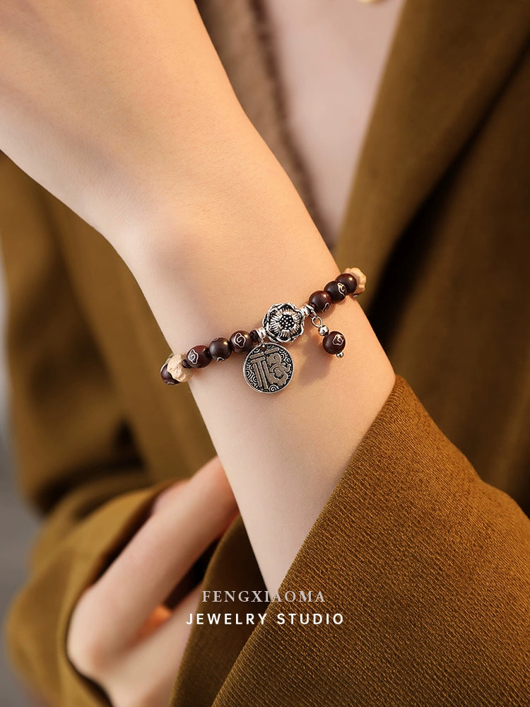 Small red sandalwood flower beaded hand female luxury small high-quality natural stone pull-out bracelet